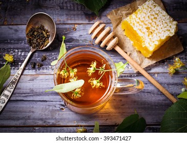 Herbal tea with linden flowers. Selective focus, toned