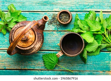 Herbal tea with nettle leaves.Herbal medicine,homeopathy.Homeopathic herbs - Shutterstock ID 1965867916