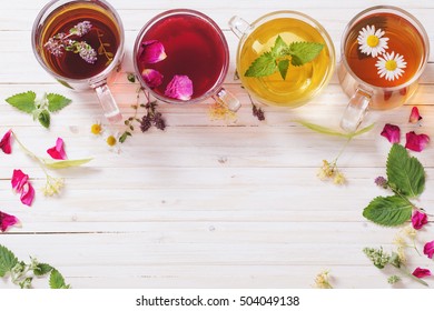 herbal tea on a white wooden background - Powered by Shutterstock