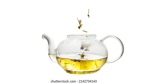 Herbal Tea Served In A Transparent Glass Teapot Isolated Over White Backgound Ready For Breakfast Or Tea Ceremony. High Quality Photo