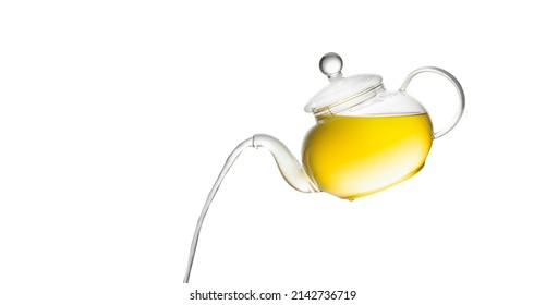 herbal tea served in a transparent glass teapot isolated over white backgound ready for breakfast or tea ceremony. High quality photo