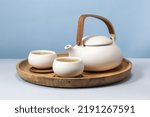 Herbal tea with two white tea cups and teapot. Tea concept