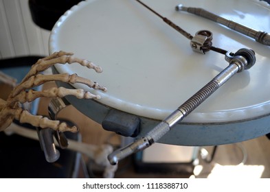 Herberton, Queensland, Australia, June 19th 2018, Skeleton Hand Reaching For Old Dentistry Equipment