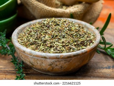 Herbes de Provence, mixture of dried herbs typical of the Provence region, blends often contain savory, marjoram, rosemary, thyme, oregano, lavender leaves, used with grilled food and stew - Shutterstock ID 2216621125