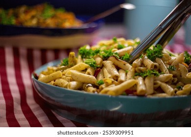 Herb-Infused Pasta Delight: A vibrant bowl of penne pasta tossed with fresh herbs and spices, garnished with parsley, ready to be enjoyed. - Powered by Shutterstock