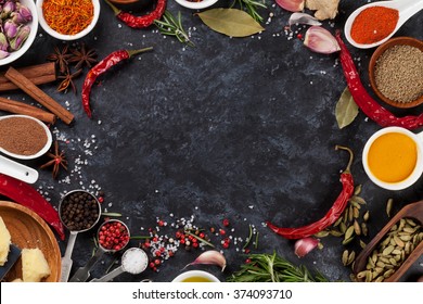 Herbs, condiments and spices on stone background. Top view with copy space - Powered by Shutterstock