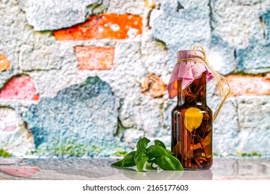 Herbs In A Decorative Bottle, Preserved Spices, Marinade, And Basil Leaves, Space For Text, Culinary Photography