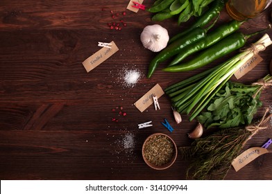 Herbs And Spices On A Blue Background; Healthy Eating; Organic Food; Basil; Hot Peppers; Papperoni;  Green Onion; Rosemary; Ingredients For Cooking; Cover For A Cookbook;organic Food; Harvest