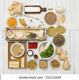 herbs and spices, still life on white wooden - Powered by Shutterstock