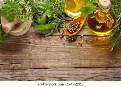 herbs,spice and oil on wooden table - Powered by Shutterstock