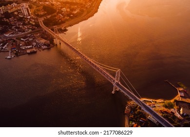 Hercilio luz cable bridge with sunset light in Florianopolis, Brazil. Aerial view - Shutterstock ID 2177086229