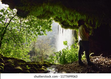 Here i am exploring a cave behind a waterfall with a friend (in photo) and everything looks awesome!!