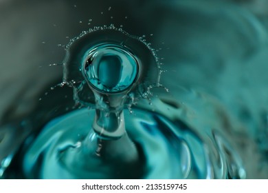 Here is a photo of water drop collision on blue and green background. It is necessary to use a particular and precise technique to obtain a good result.