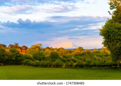 A Herefordshire Country Sunset. With A Village/croft.