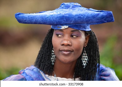 Herero African Girl With Traditional Clothing, Hairstyle And Jewelry, Namibia, South Africa, And Botswana