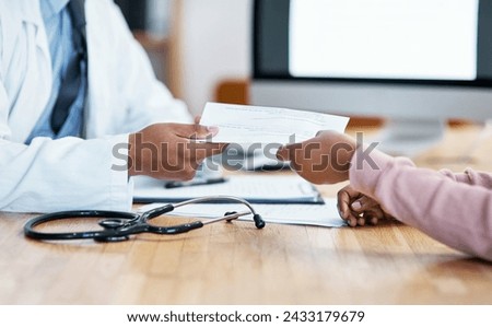 Heres your sick note for work. Closeup shot of an unrecognisable doctor giving paperwork to a patient during a consultation.