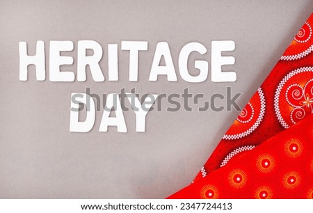 Heritage Day South Africa. Heritage Day written in white letters with iconic South African printed cloth