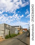 Heritage shacks that cannot be changed, but are facades for accommodation that looks much nicer on the other side of the shack, in Broken Hill, a mining town past its mining heyday, in Australia.