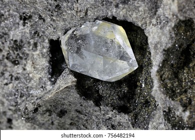 Herkimer diamond nestled in bedrock