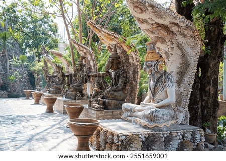 hermit statue in the forest