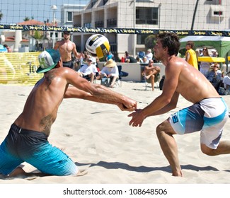 HERMOSA BEACH, CA - JULY 21: Derek Olson and Matt Motter compete in the Jose Cuervo Pro Beach Volleyball tournament in Hermosa Beach, CA on July 21, 2012.