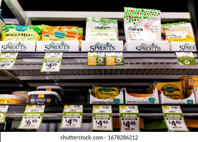 Herndon, USA - March 18, 2020: Sprouts Farmers Market Shelf Grocery Packaged Retail Display Of Vegan Plant-based Dairy Free Natural Health Food Cheese Follow Your Heart And Private Label Products