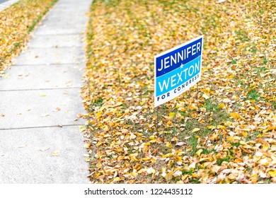 Herndon, USA - November 1, 2018: Political Election Sign For Democrat Congress Woman Jennifer Wexton Representative On Lawn In Autumn, Golden Leaves Foliage In Virginia