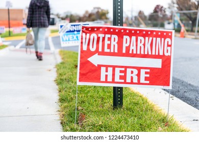 Herndon, USA - November 6, 2018: Voter Parking Here Sign At High School Polling Station With Arrow On Sidewalk, Road, Jennifer Wexton, Democratic Party Candidate, People, Person Walking