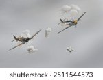 Hero of Dunkirk - Spitfire Ia N3200 in a dogfight scene with the hero of the 1969 film ,,Battle of Britain" - Hispano HA-112 MIL Buchon “Yellow 10” ​​over Duxford in the United Kingdom