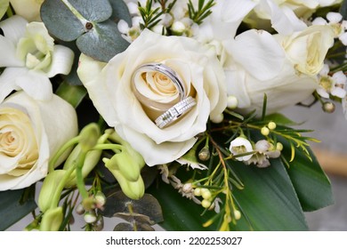 Hero Shot Of Engagement Rings With Flowers 