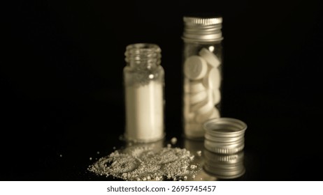 Heroin or crushed oxycodone placed in a container. Powdered illegal drugs stored in a glass vial, indicating substance abuse. Ongoing crisis involving opioids and fentanyl. 