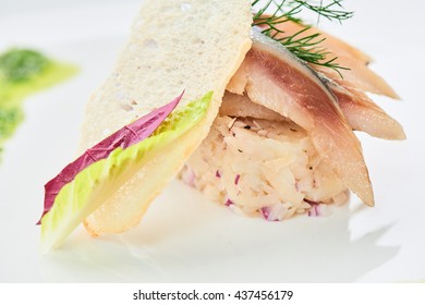 Herring with potatoes served on a white plate - Shutterstock ID 437456179