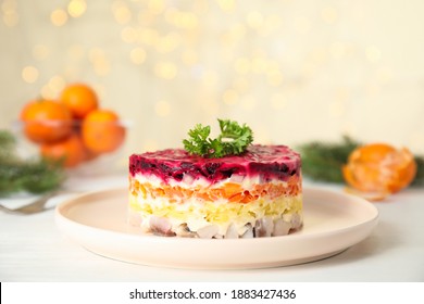 Herring Under Fur Coat Served On White Table, Space For Text. Traditional Russian Salad