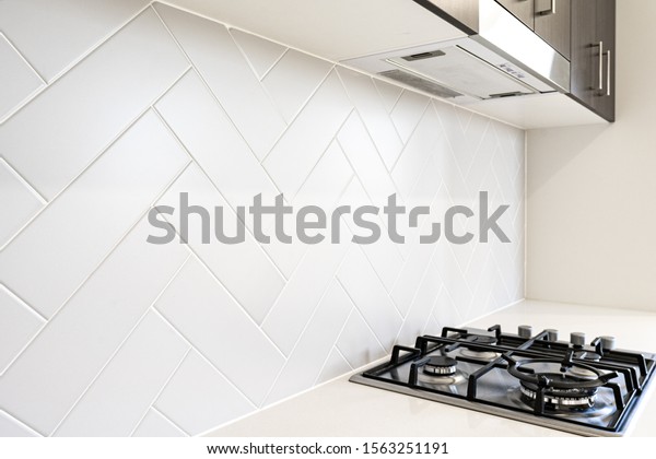 Herringbone Kitchen tile splash\
backs