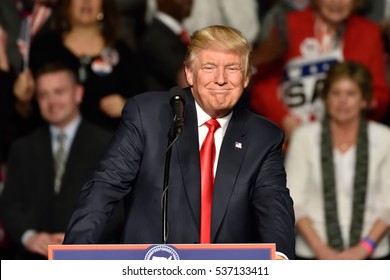 HERSHEY, PA - DECEMBER 15, 2016: President-Elect Donald Trump smiles as he pauses during a speech at a "Thank You" tour rally held at the Giant Center.