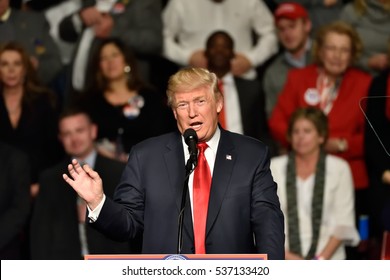 HERSHEY, PA - DECEMBER 15, 2016: President-Elect Donald Trump gestures during a speech to a large crowd at a Thank You rally held at the Giant Center.