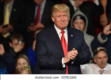 HERSHEY, PA - DECEMBER 15, 2016: President-Elect Donald Trump arrives on stage to deliver a speech at a Thank You tour rally held at the Giant Center.