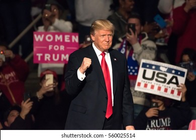 HERSHEY, PA - DECEMBER 15, 2016: President-Elect Donald Trump gives a "Fist Pump" as the confidently arrives on stage to deliver a speech at the "Thank You" Tour rally at the Giant Center.