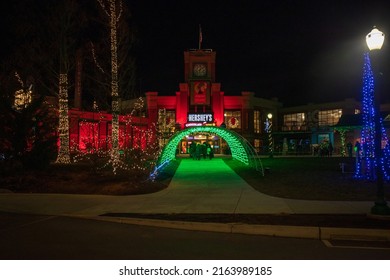 Hershey, Pennsylvania, USA - December 20 2021: Hersheys Chocolate World Entrance At Night. Christmas Light.