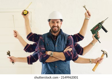 Hes Got All The Tools Youll Need. Portrait Of A Handsome Young Handyman Tools In Multiple Hands.