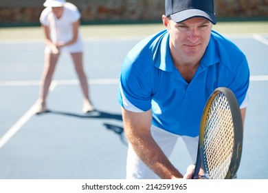 Hes Got His Game Face On. A Mixed Doubles Team Standing Ready To Receive A Serve - Tennis.