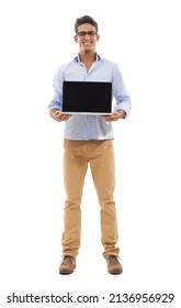 Hes Got A New Laptop For You. Full Body Portrait Of A Handsome Young Man Happily Displaying A Laptop.