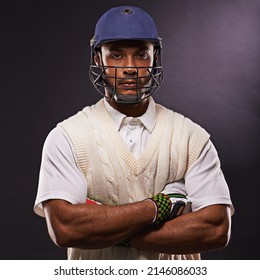 Hes up next. A cropped shot of an ethnic young man in cricket attire isolated on black. - Powered by Shutterstock