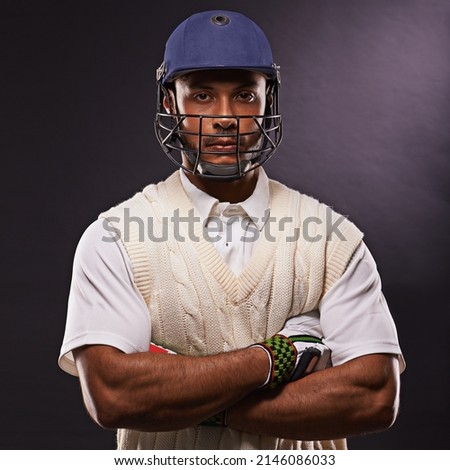 Hes up next. A cropped shot of an ethnic young man in cricket attire isolated on black.