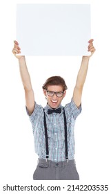 Hes Proud To Bring You Something Brand New. Portrait Of An Excited Young Man Holding Up A White Sign.