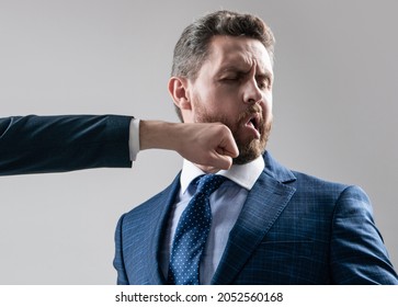 Hes a punching bag. Employee got punch in chin. Man punched in face. Fighting and punching - Shutterstock ID 2052560168