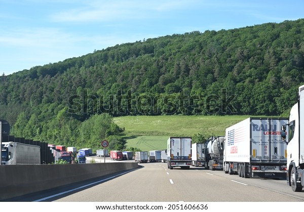 Hesse, Germany - June 14, 2021: Truck traffic jam on a\
highway 