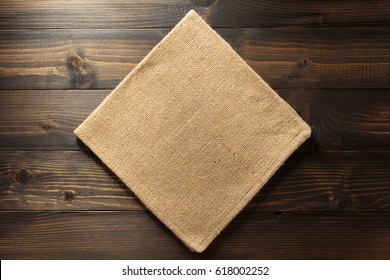 Hessian Burlap Napkin On Wooden Background