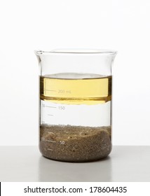 heterogeneous mixture - water, oil and sand. - Shutterstock ID 178604435