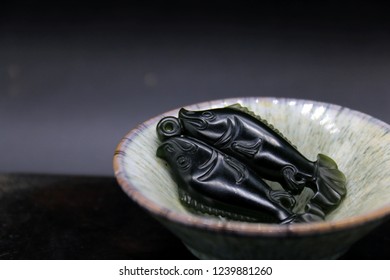 Hetian jade ink carving - Powered by Shutterstock